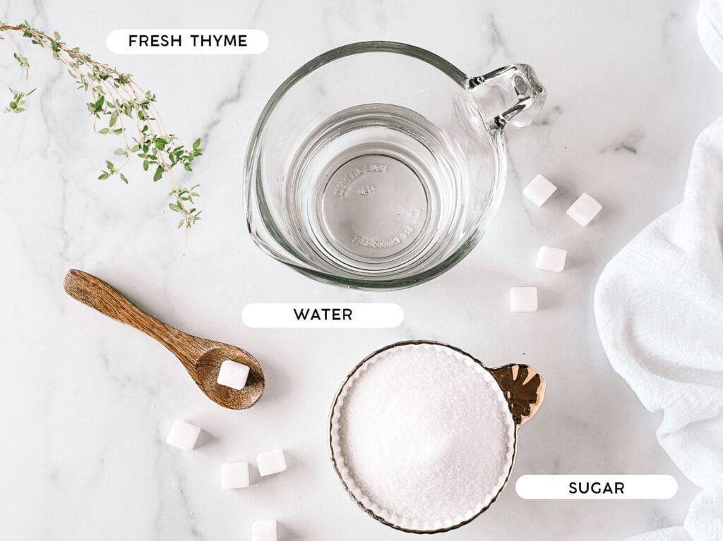 Photo of thyme infused simple syrup in a clean glass jar