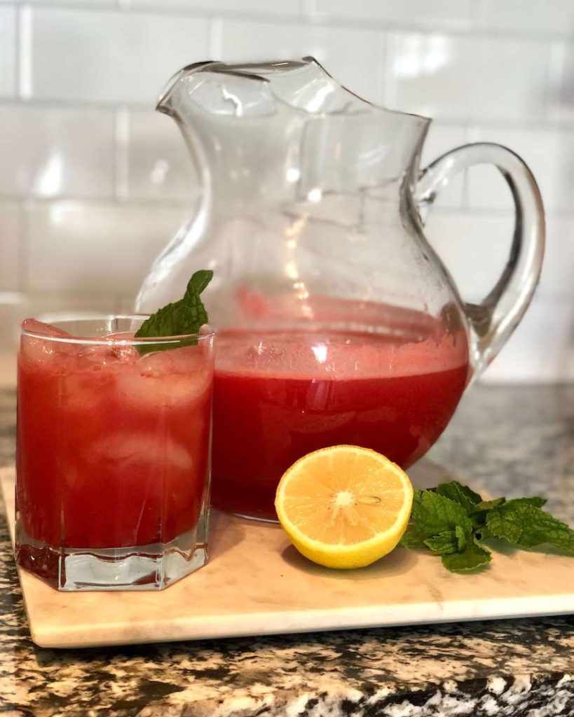 Watermelon Lemonade in a glass pitcher