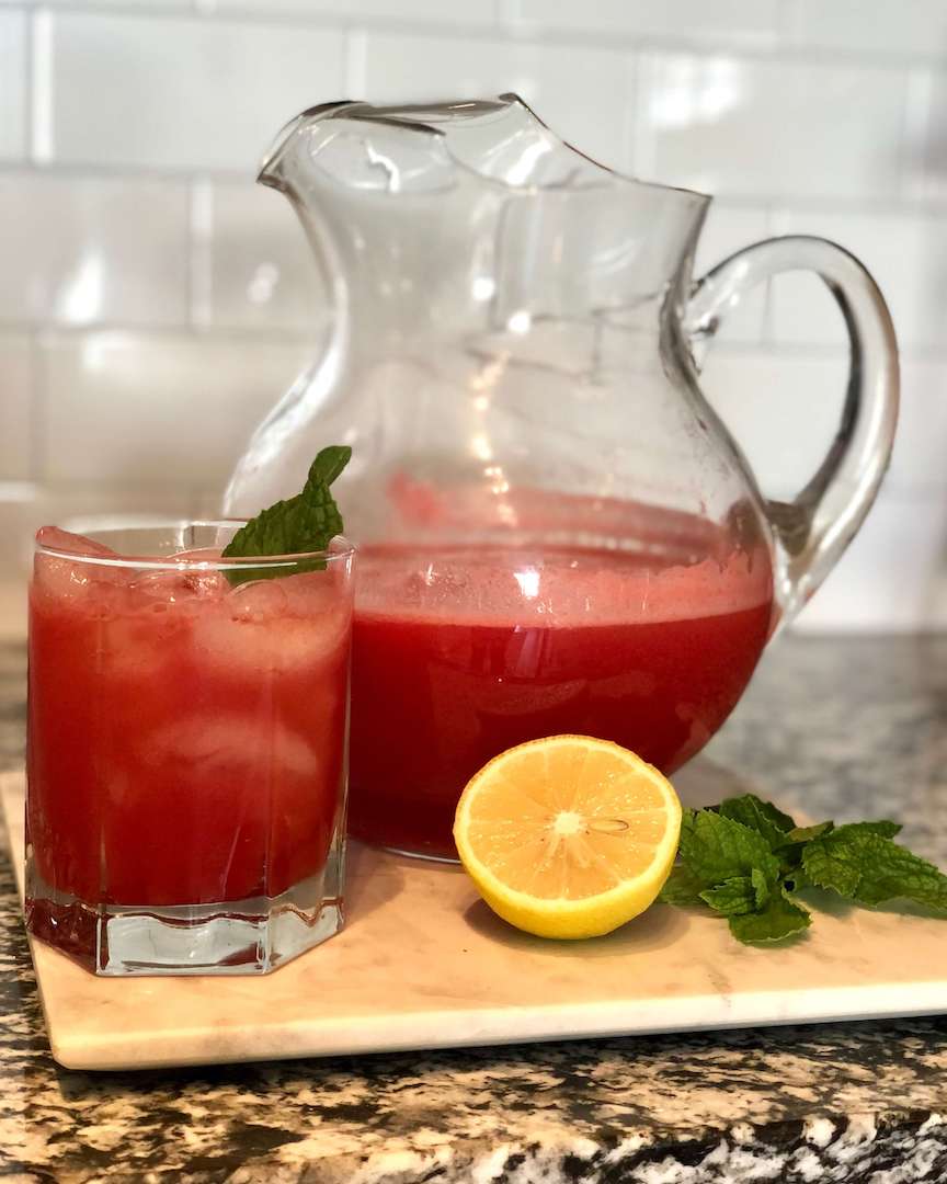 Watermelon Lemonade in a glass pitcher