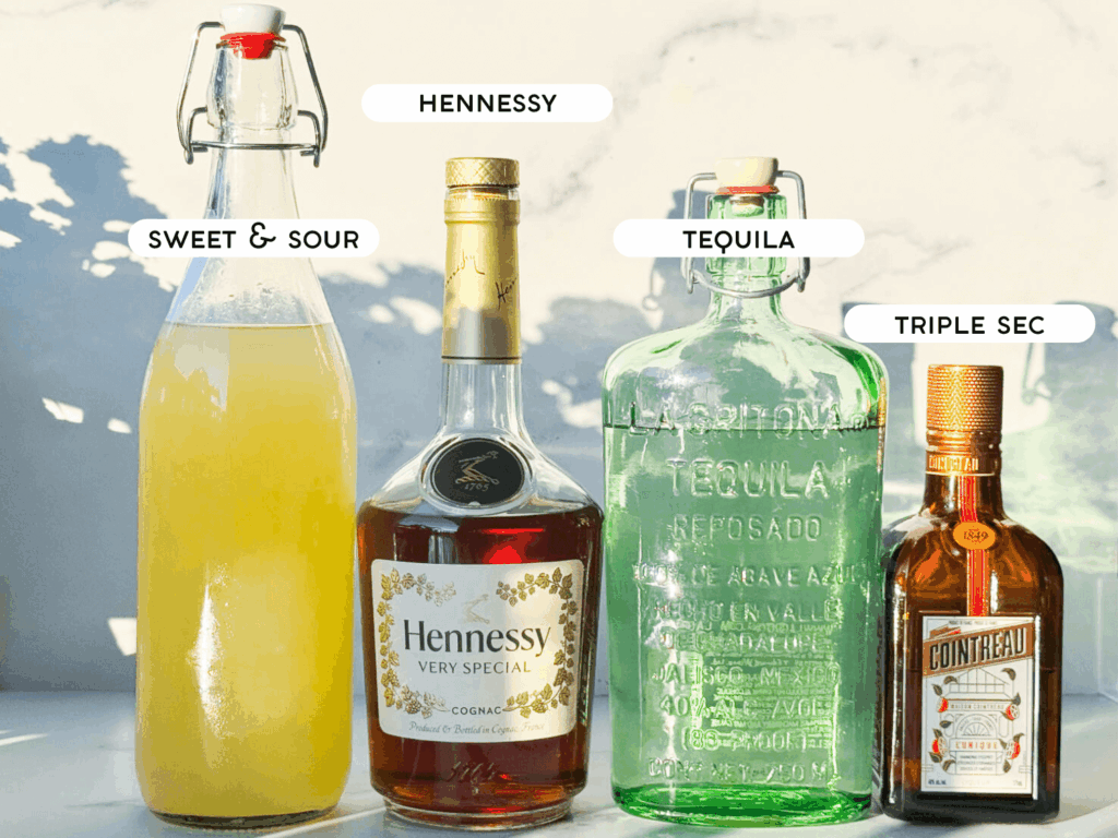 photo of Hennessy Margarita ingredients such as Hennessy, Triple Sec, Tequila, and Sweet and Sour Mix