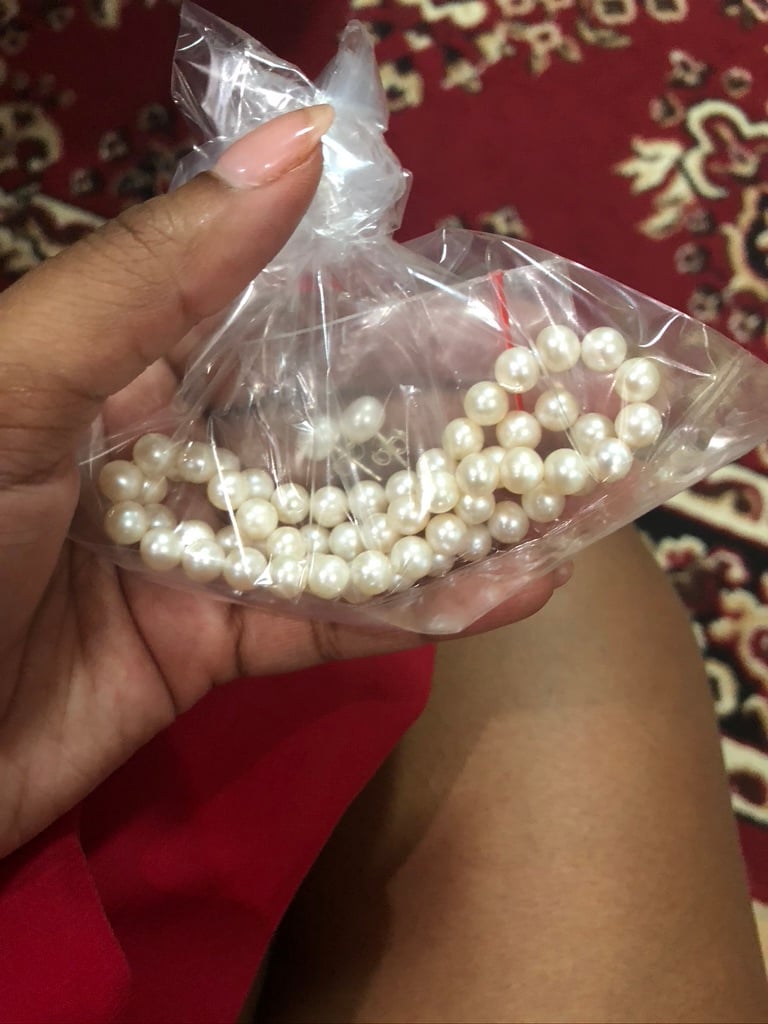 a photo of a bag of pearls purchased at anika tailor in bali