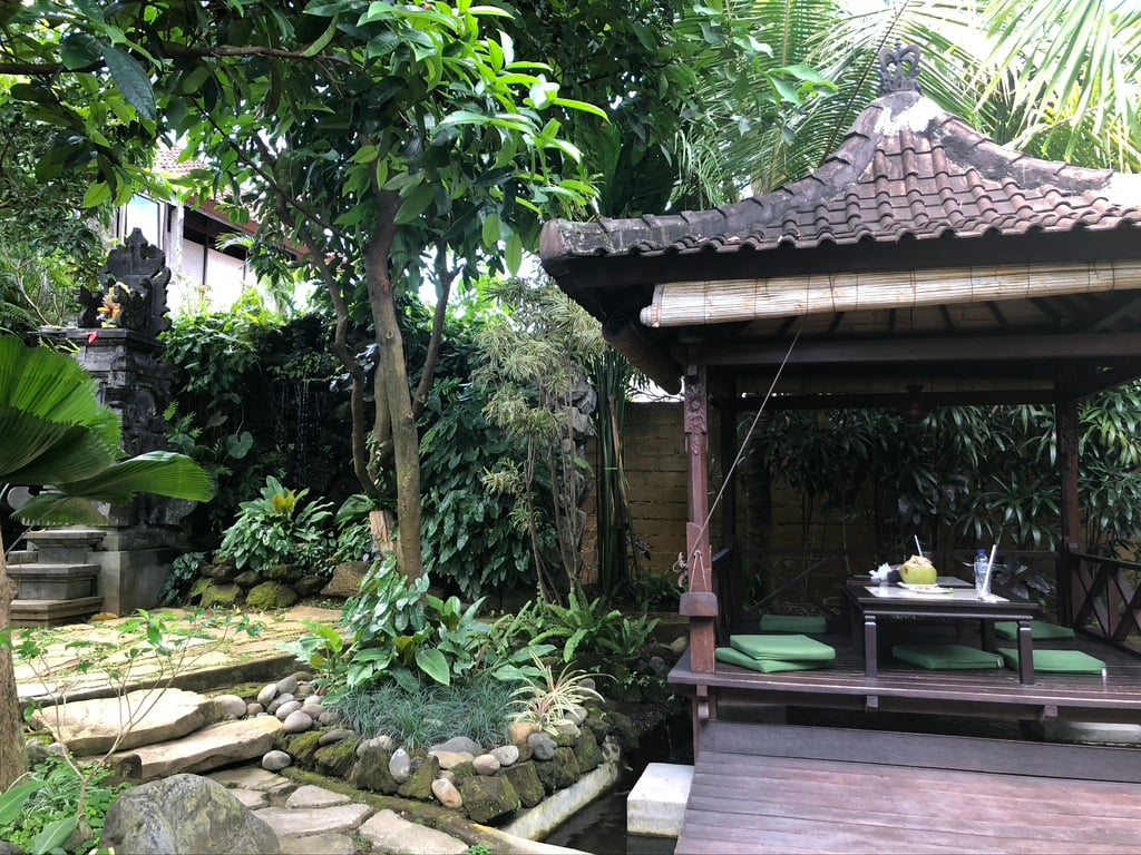 A photo by Elicit Folio of the Warung Mina restaurant's outdoor seating