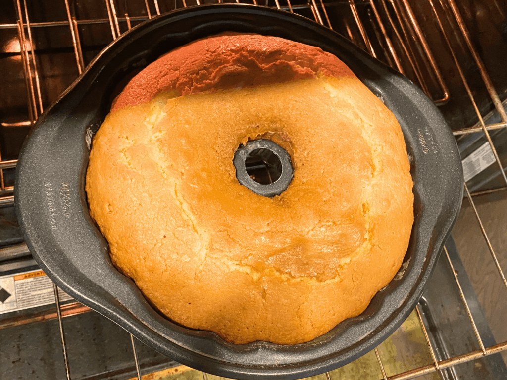 photo of cream cheese pound cake coming out of the oven