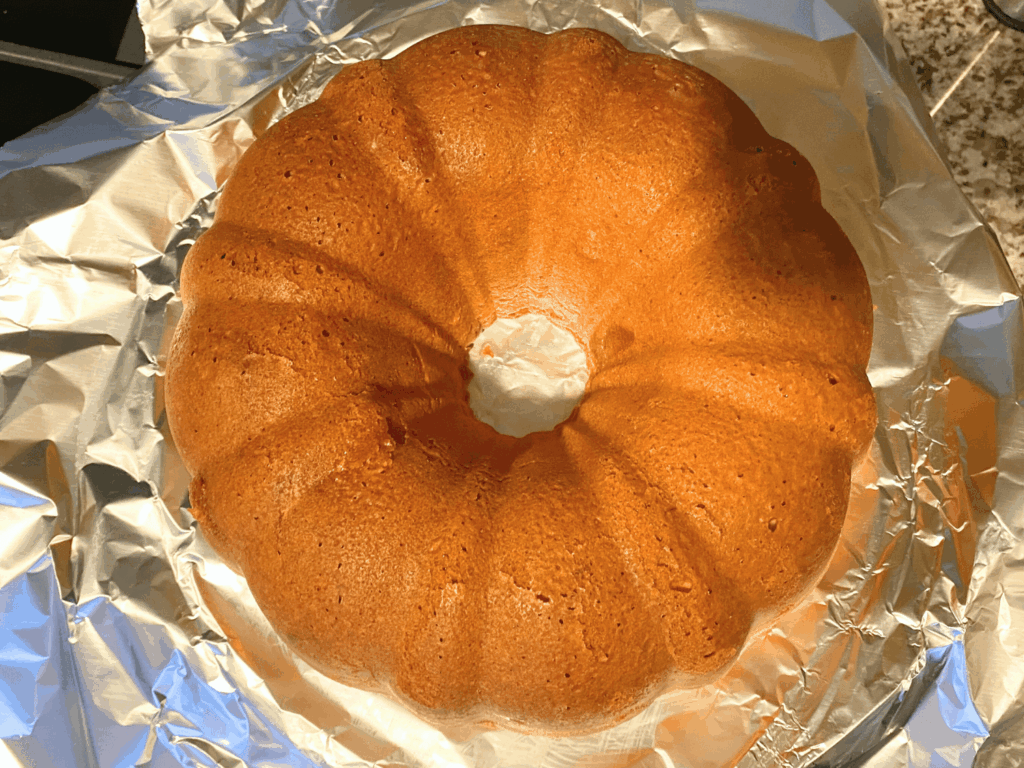 top down photo of cream cheese pound cake that's out of the oven