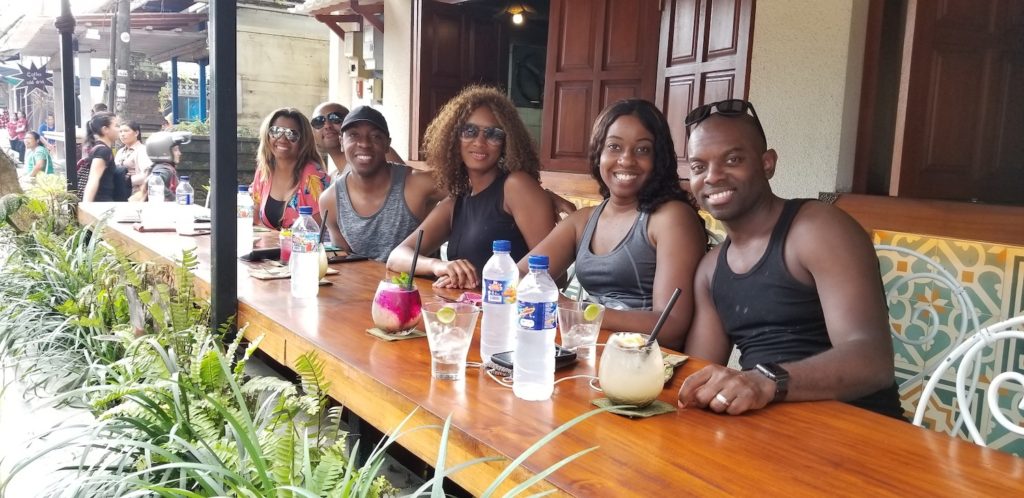 A photo of a group of tourist sitting outside the OOPS Restaurant and Bar in Ubud Bali