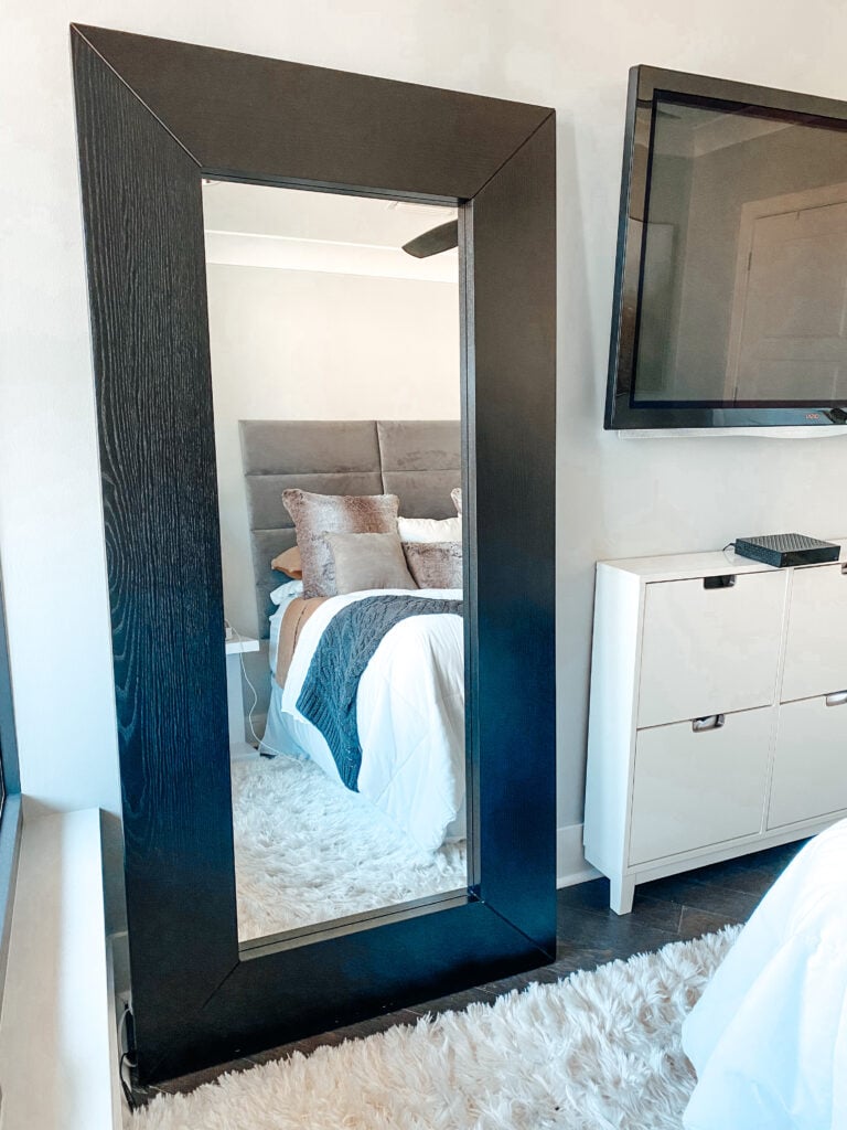 Photo of full length mirror in guest bedroom