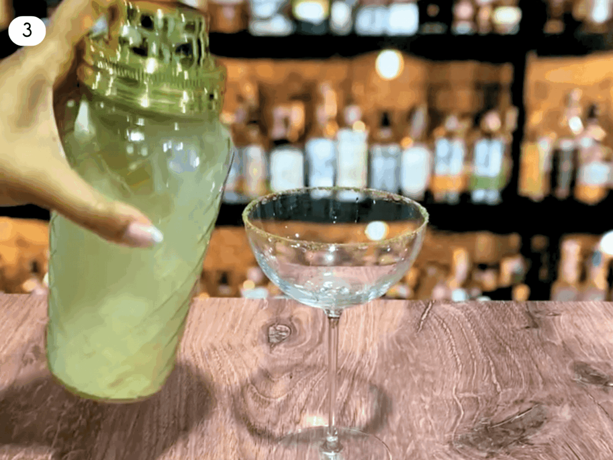 step 3 photo showing eggnog cocktail being shaken in a cocktail shaker