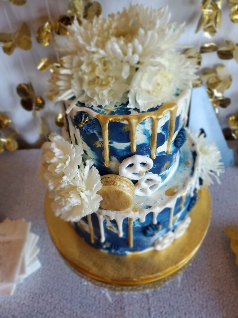 Photo of bridal shower cake gold and navy blue