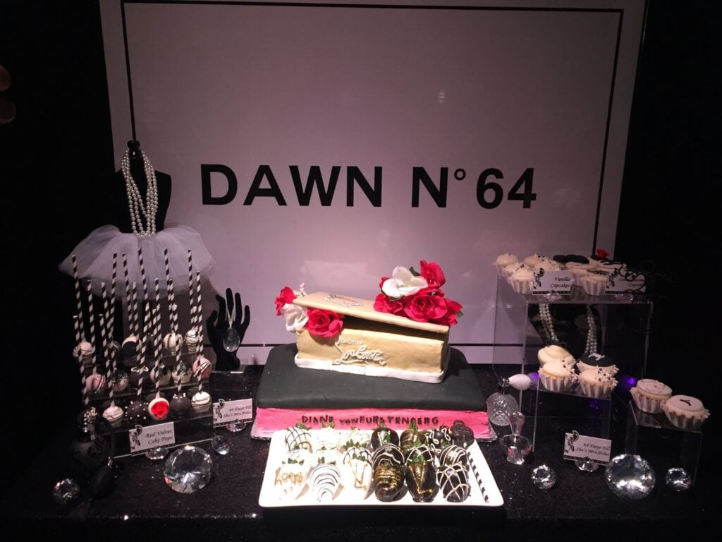 Photo of fashion cake on dessert table