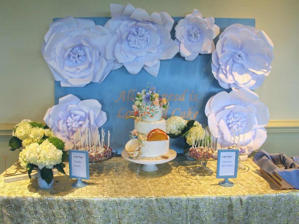 Photo of dessert table with taco an tea cake and cake pops