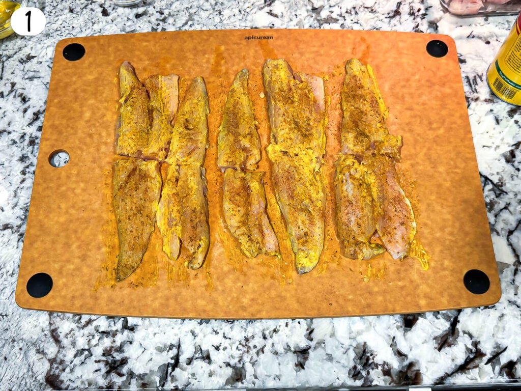 photo of fish with mustard and seasoning