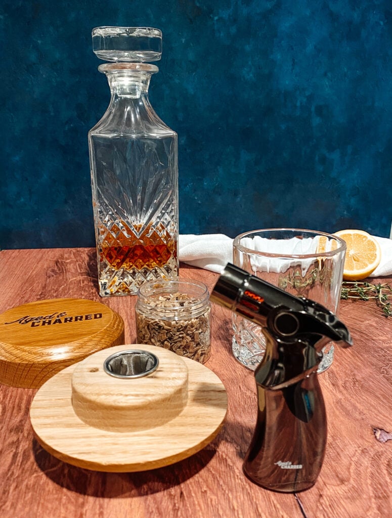 Aged & Charred Cocktail Smoker Kit with bourbon & fresh ingredients Photo by Elicit Folio