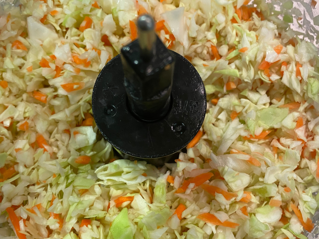Photo of coleslaw in food processor