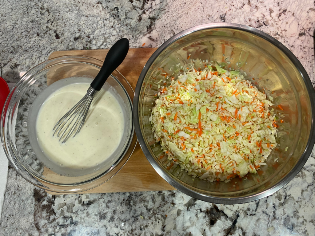 Photo of chopped vegetables and coleslaw dressing