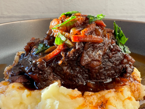 photo of cooked braised beef short ribs in red wine reduction sauce
