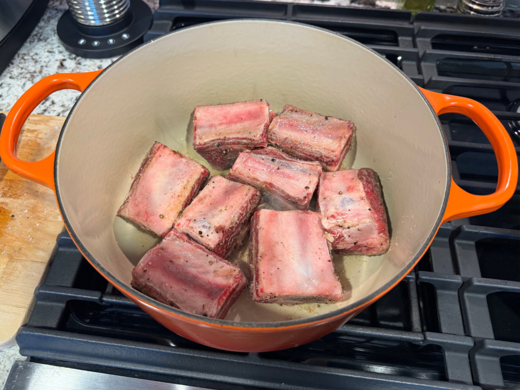 Photo of short ribs in dutch oven
