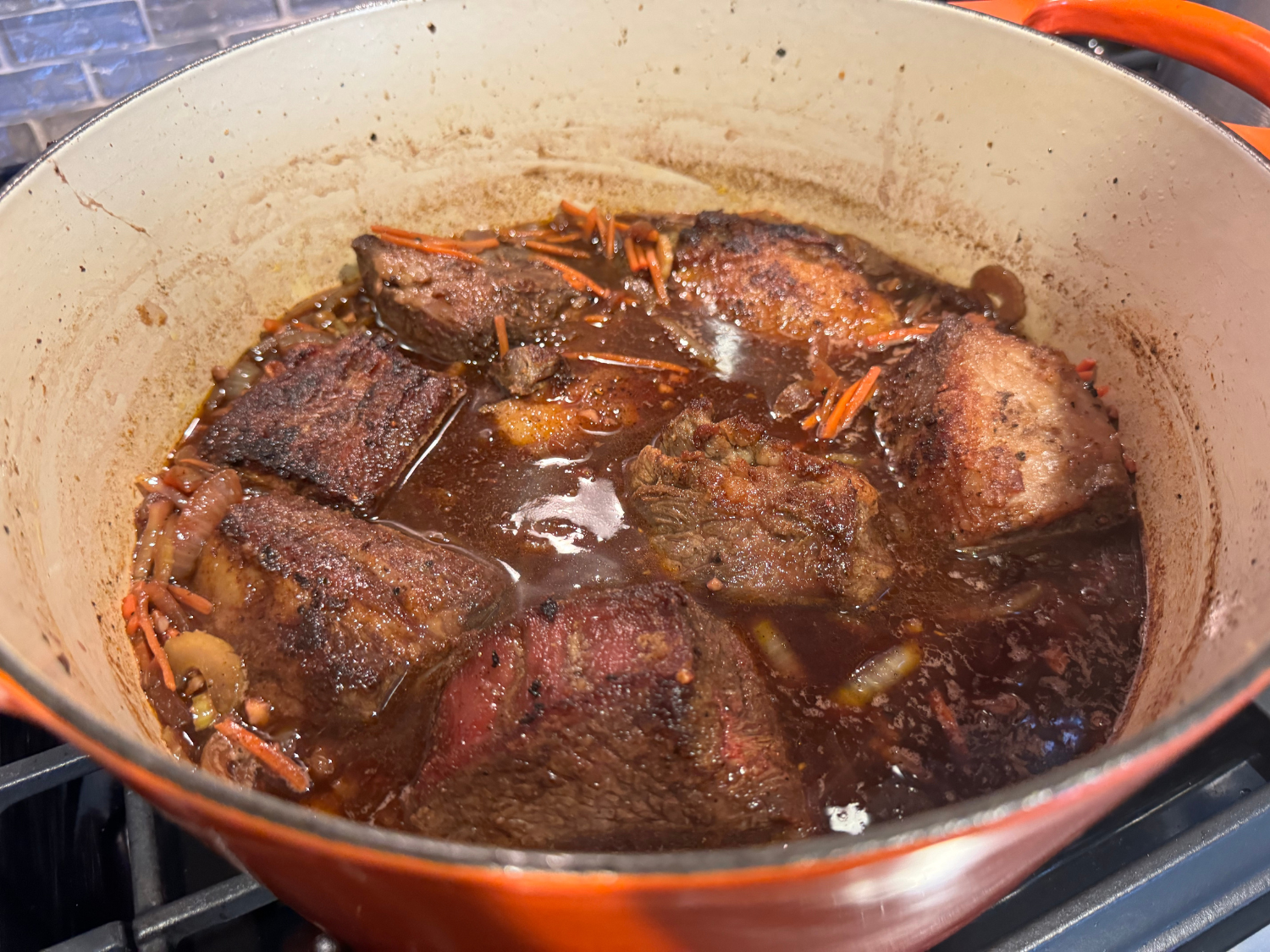 photo of braised beef short rib in red wine reduction sauce