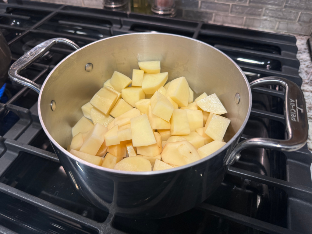 photo of diced potatoes before making sour cream and leek mashed potatoes