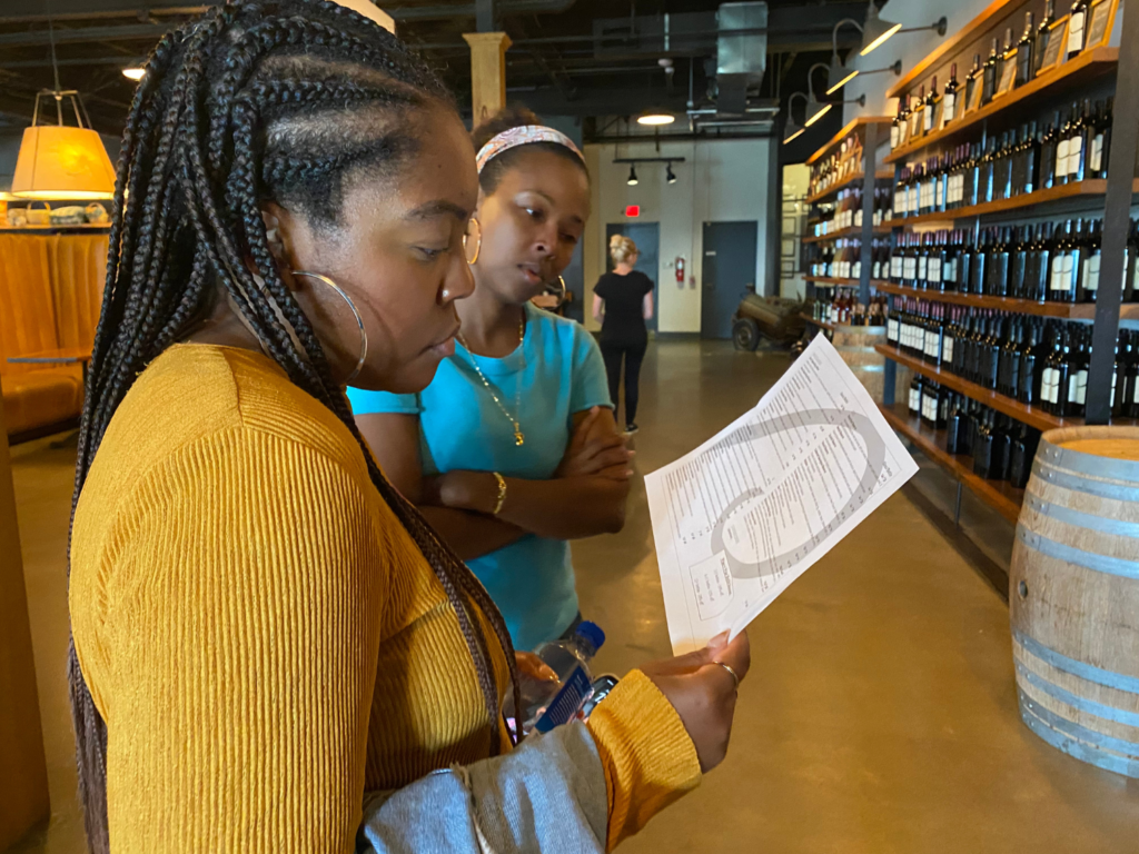 Photo of two women looking at wine menu at Chateau Elan Winery and Resort