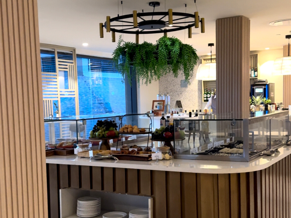 photo of food station inside club level lounge at dreams flora punta cana