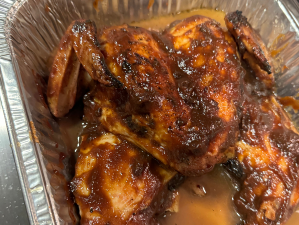 Photo of apple butter chicken in a pan with chicken broth