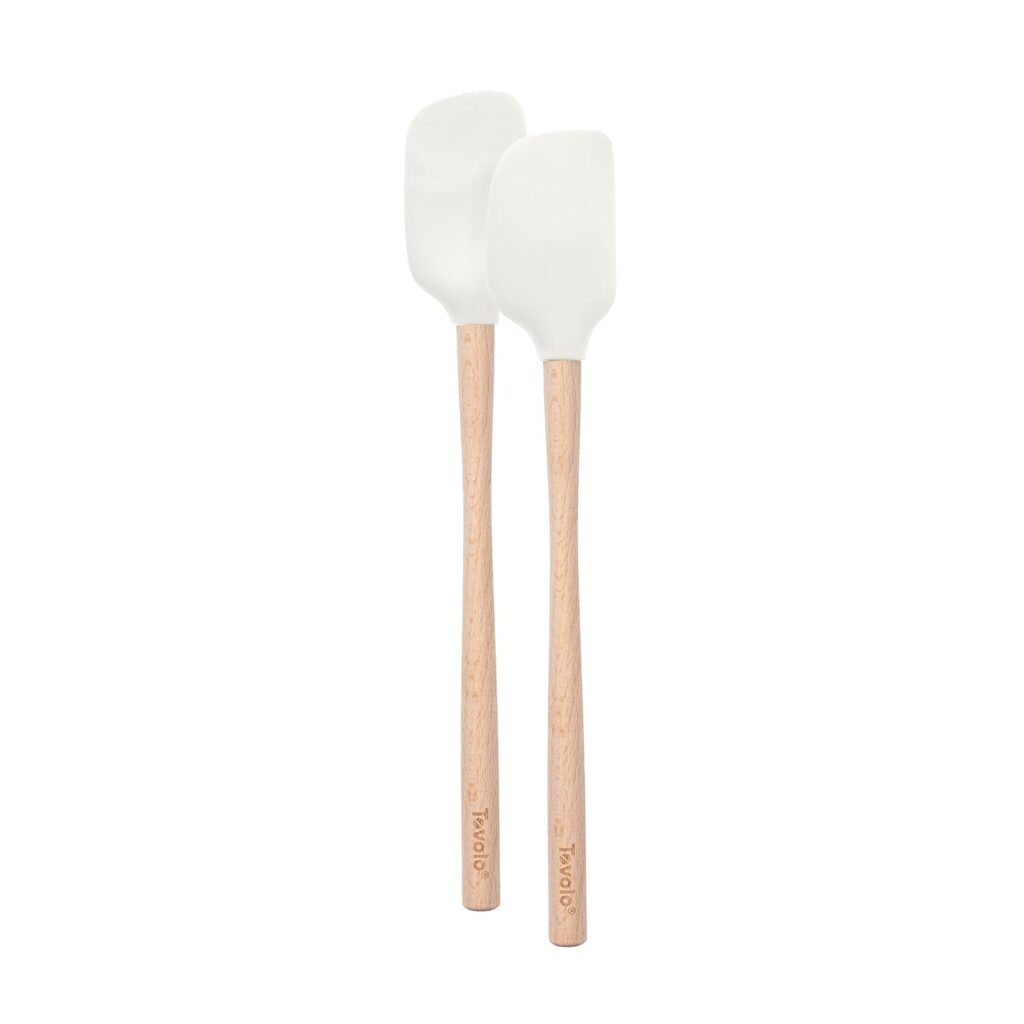 Photo white spatula for fondue party setting
