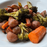 Photo of oven roasted carrots, broccoli, and baby red potatoes