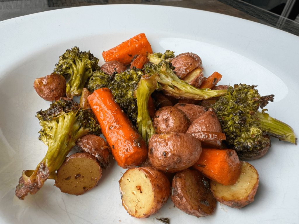 Photo of oven roasted carrots, broccoli, and baby red potatoes