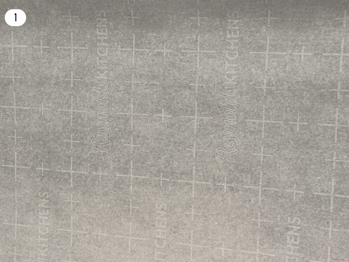 step 1 photo showing parchment paper on a pan