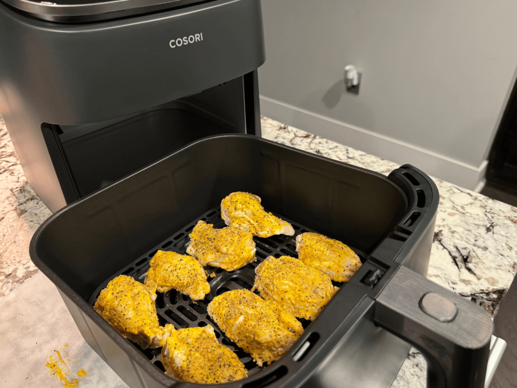 photo of lemon pepper chicken wings getting ready to go inside of the air fryer