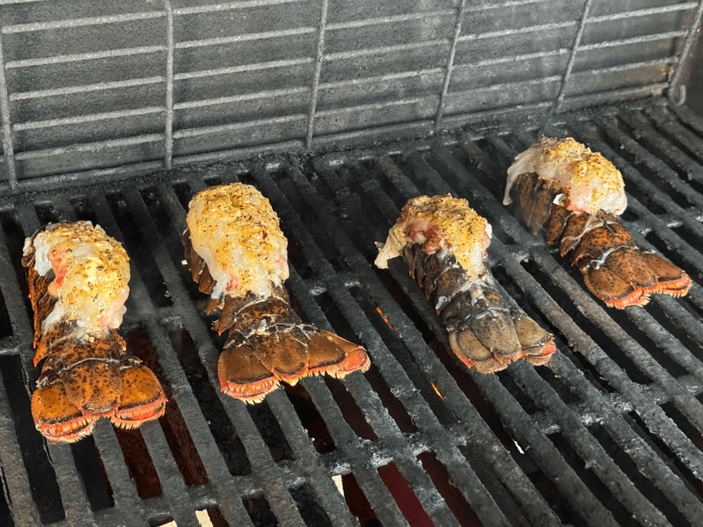 photo of lobster tails on the grill