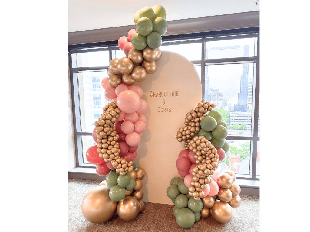 balloon decor setup for wine and charcuterie party