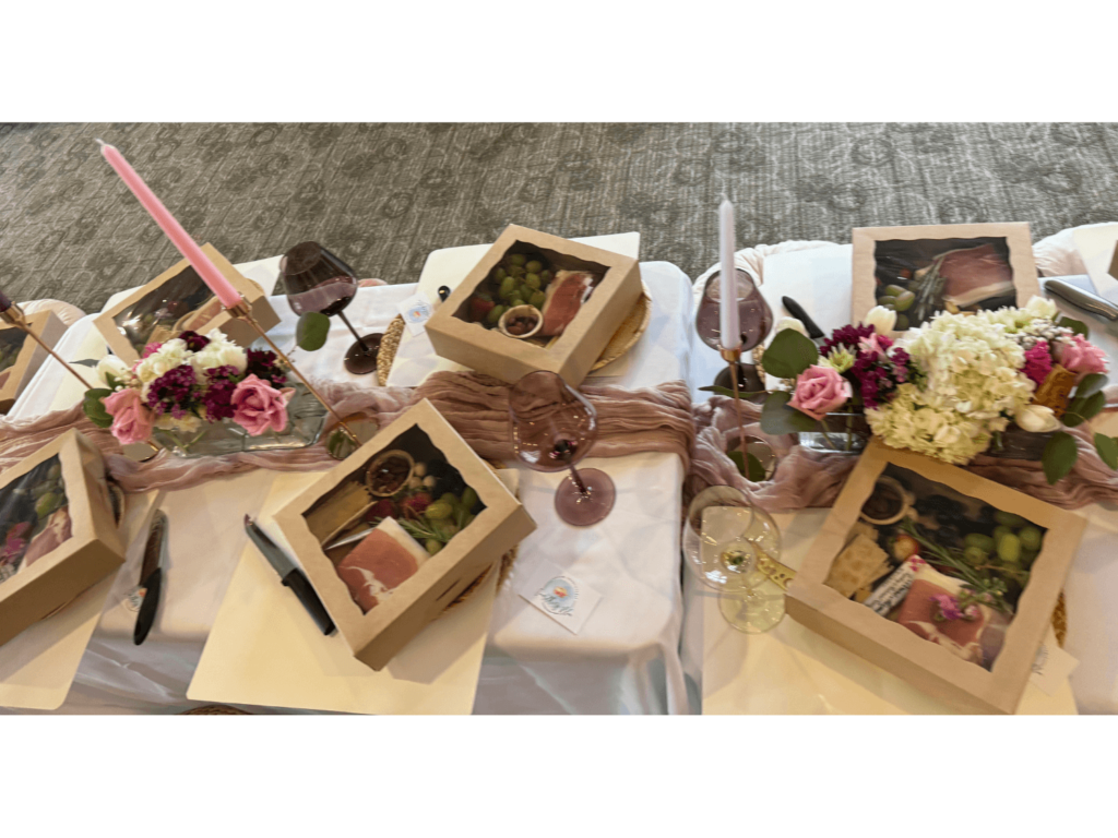 photo of charcuterie place settings with candles