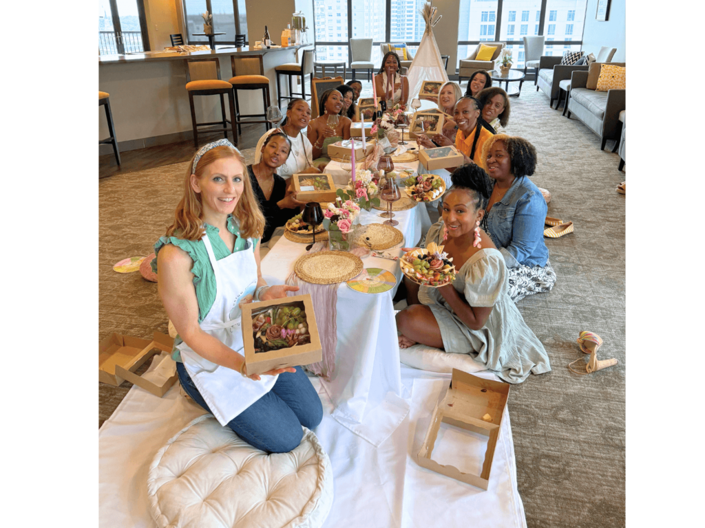 Group photo of girls after their boards were done at wine and charcuterie party