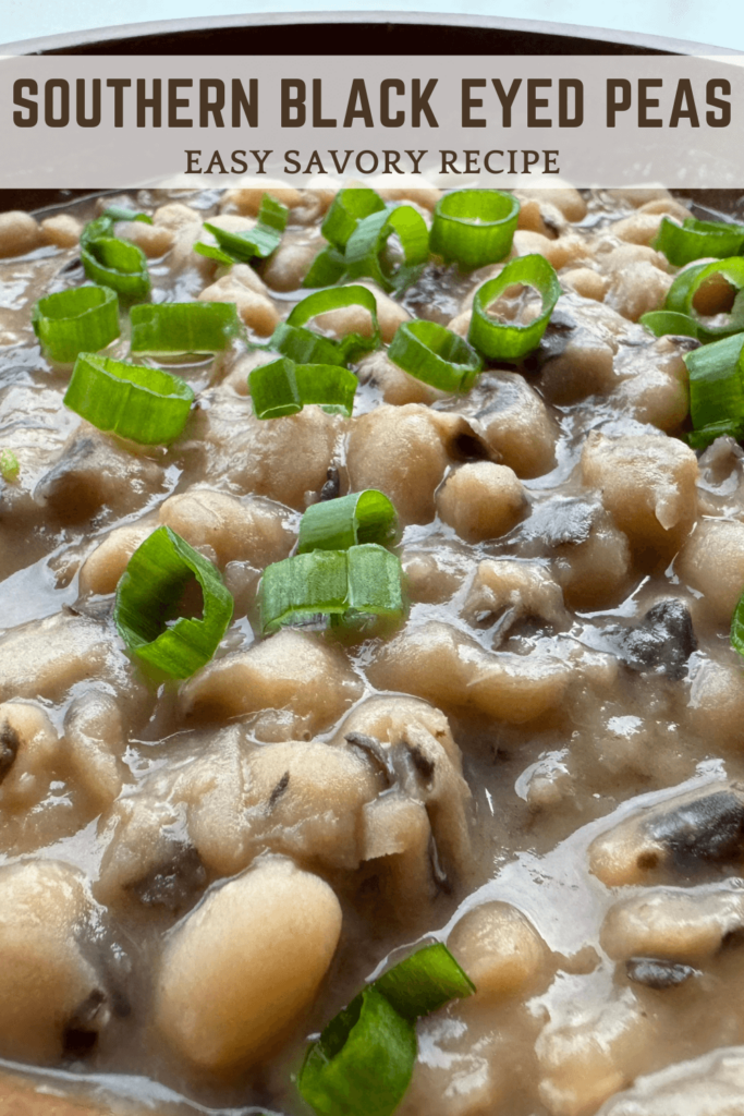 Pinterest Pin for Close up photo of cooked black-eyed peas topped with chopped green onions as a garnish
