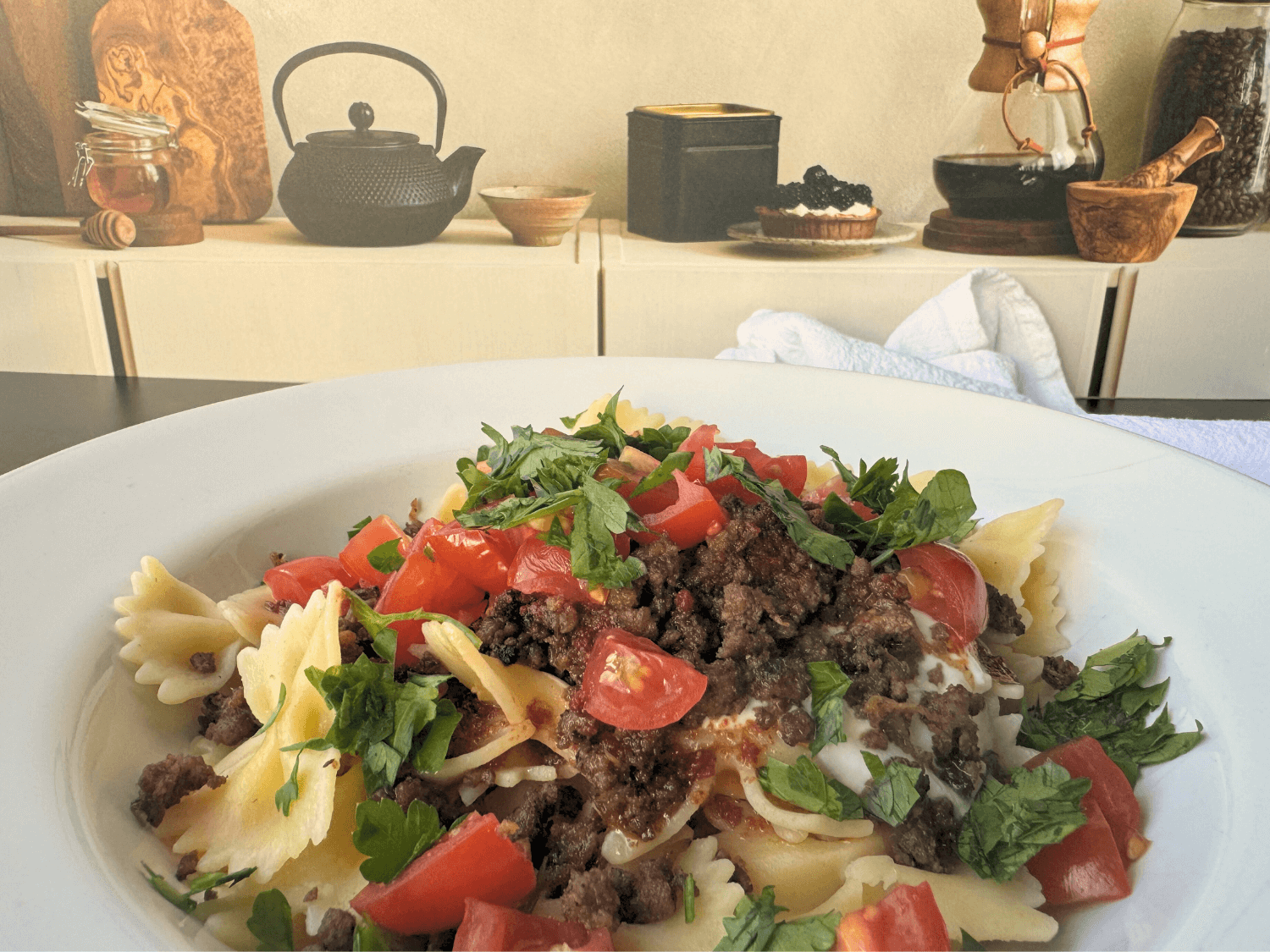 Photo of Turkish pasta (Yalancı Mantı) in a white bowl