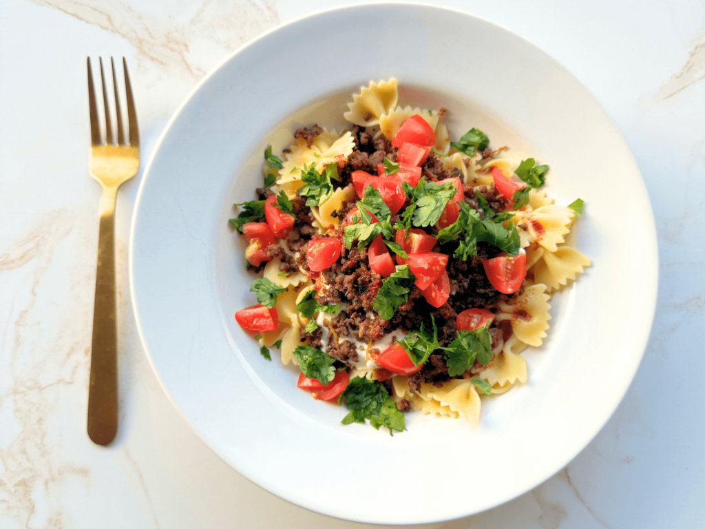 Photo of Turkish pasta (Yalancı Mantı) in a white bowl