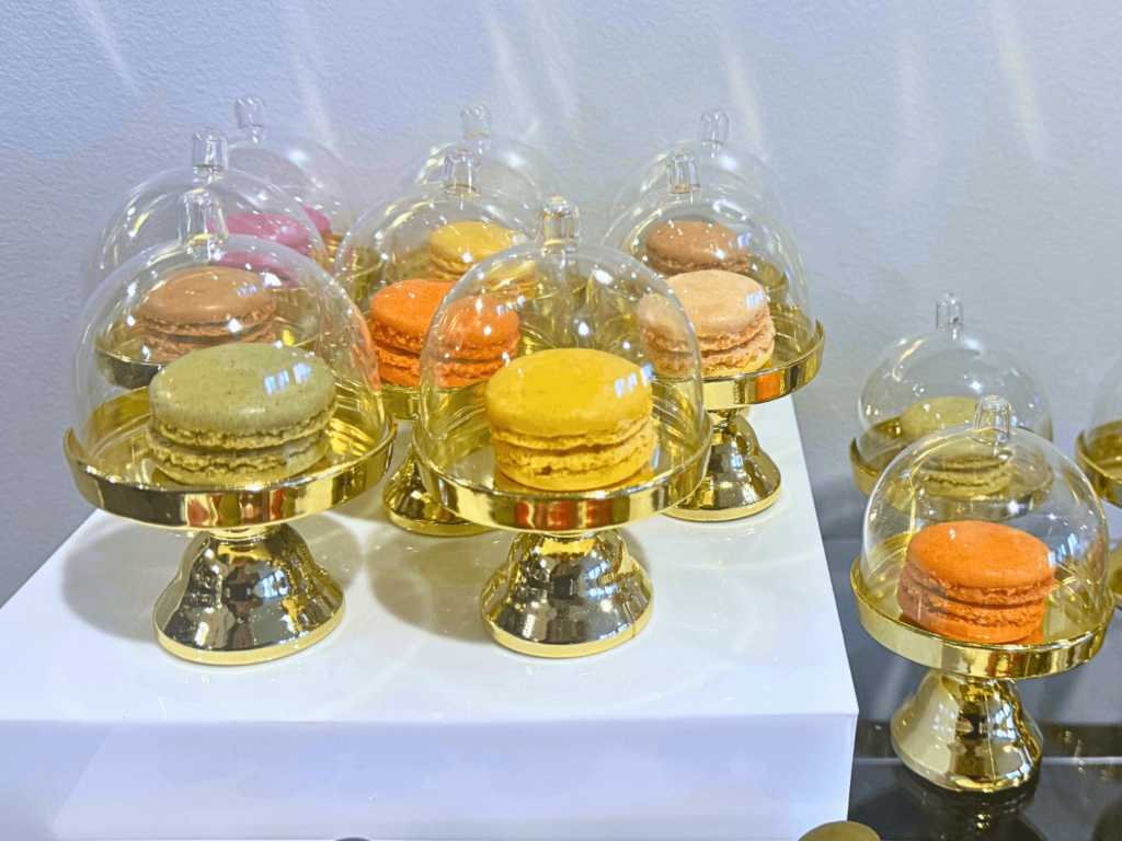 up close photo of mini cake domes to hold macarons