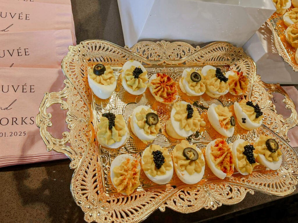 deviled eggs on a gold tray for brunch party