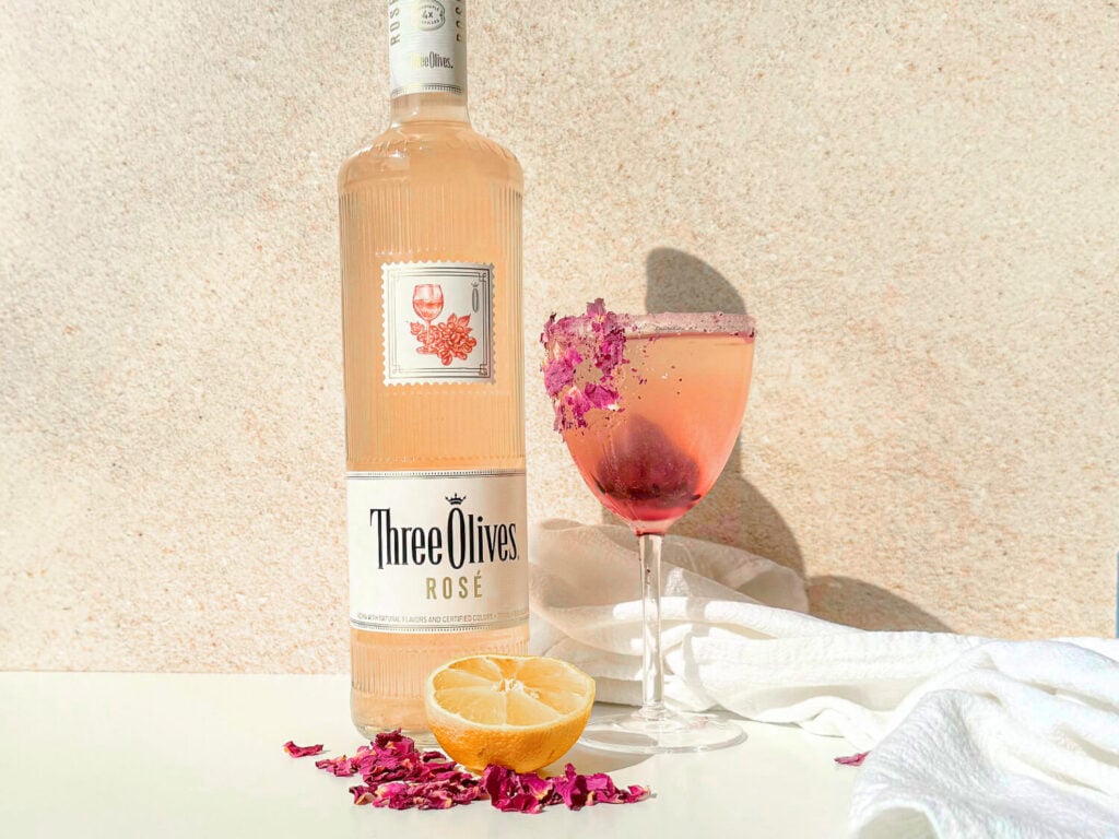 Rosé martini next to a bottle of Rosé Vodka