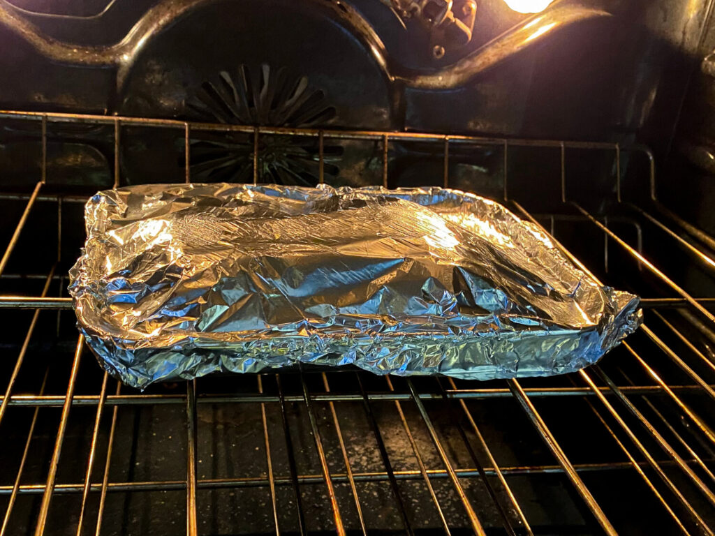 Teriyaki Salmon wrapped in foil in the oven