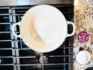 photo of water and sugar in a pot