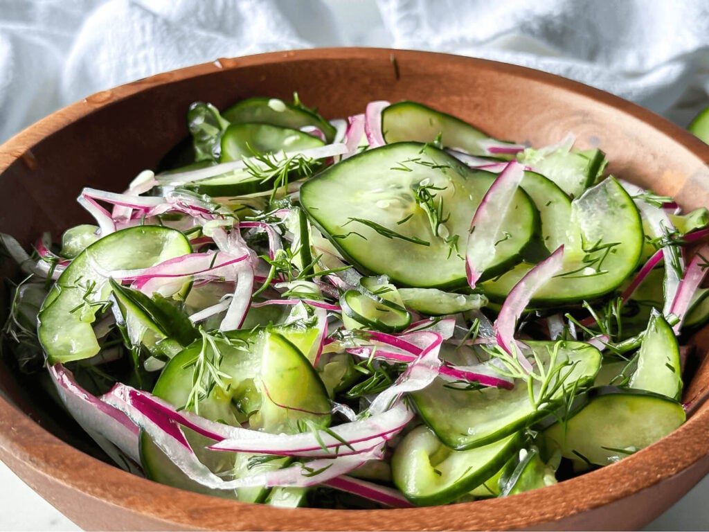 Photo of Cucumber Dill Salad in a wooden bowl
