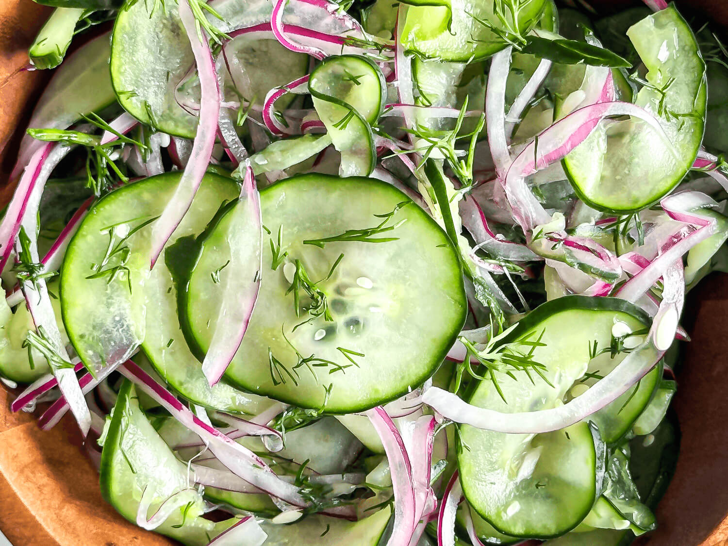 Close up photo of cucumber dill salad