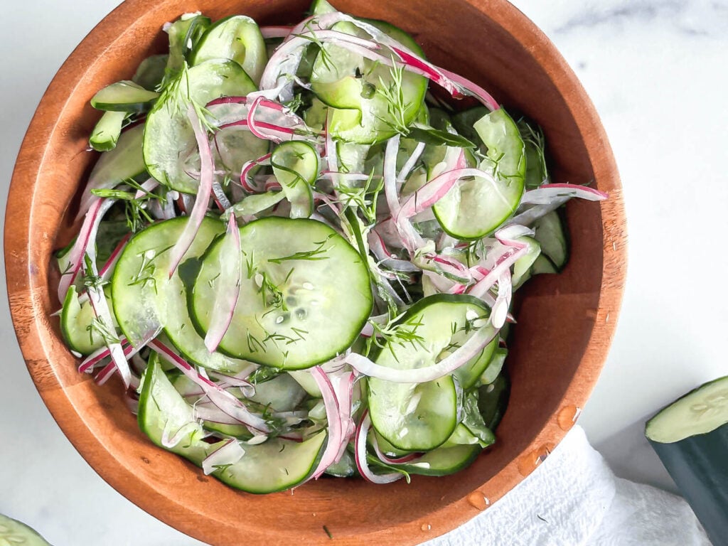 Photo of Cucumber Dill Salad in a wooden bowl