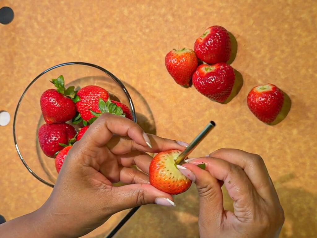picture of hulling strawberries
