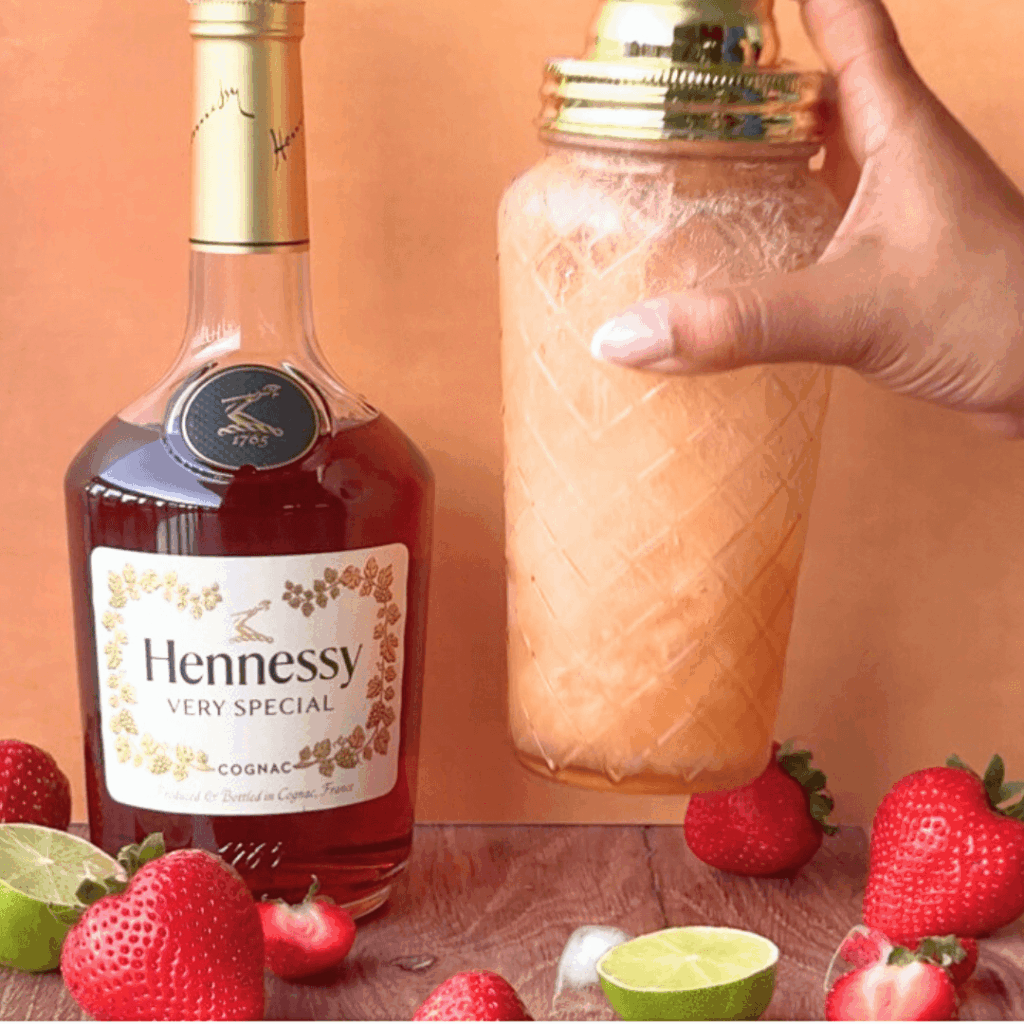 Step 3 photo of shaking ingredients together in a cocktail shaker