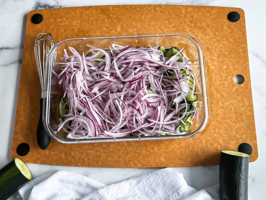 Cucumber dill salad in an airtight container
