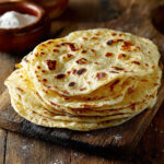 photo of cooked flour tortillas stacked on top of each other