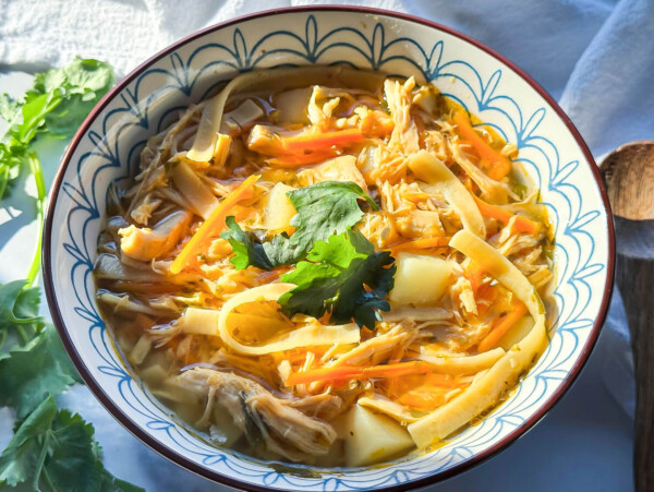 Photo of chicken noodle soup in a bowl